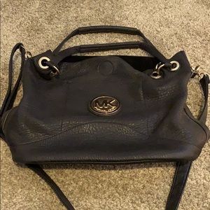 Michael Kors black large purse with gold accents